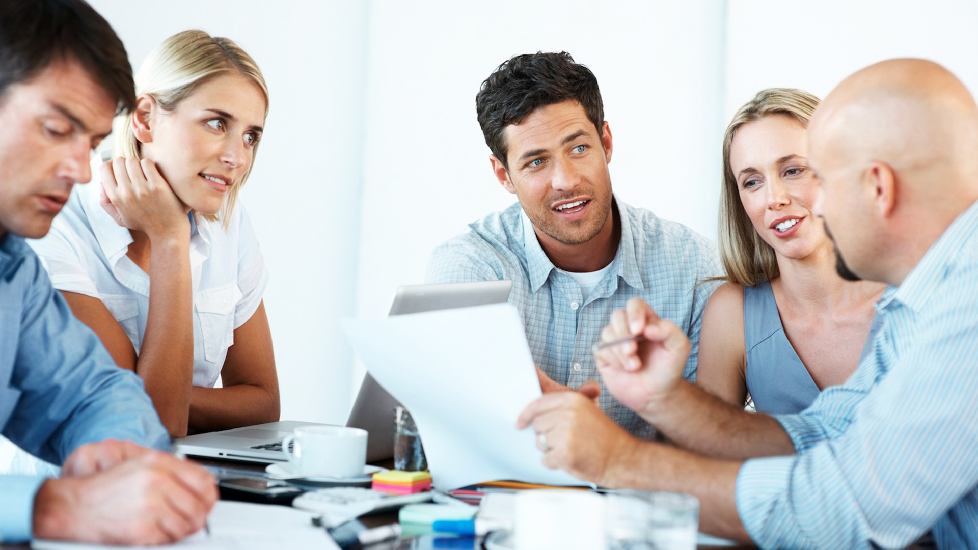 Business team working on their business project together at office - Team work