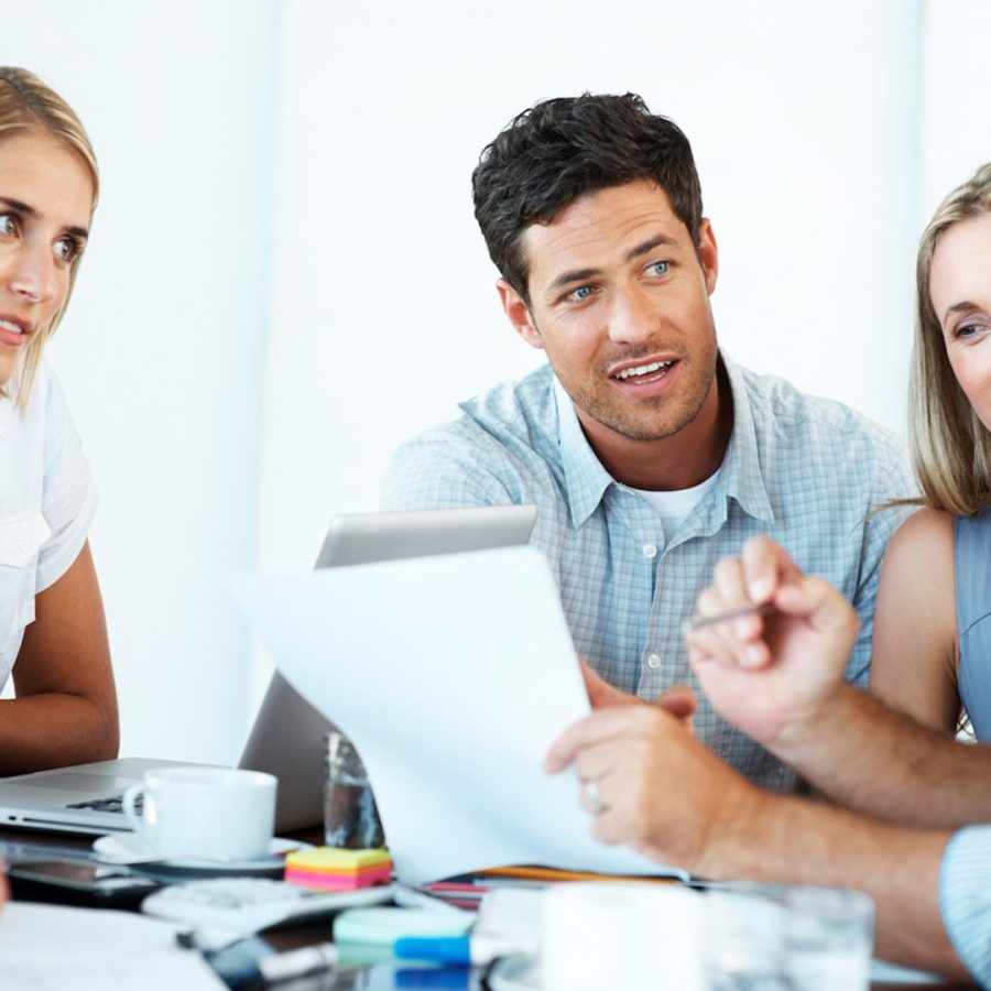 Business team working on their business project together at office - Team work